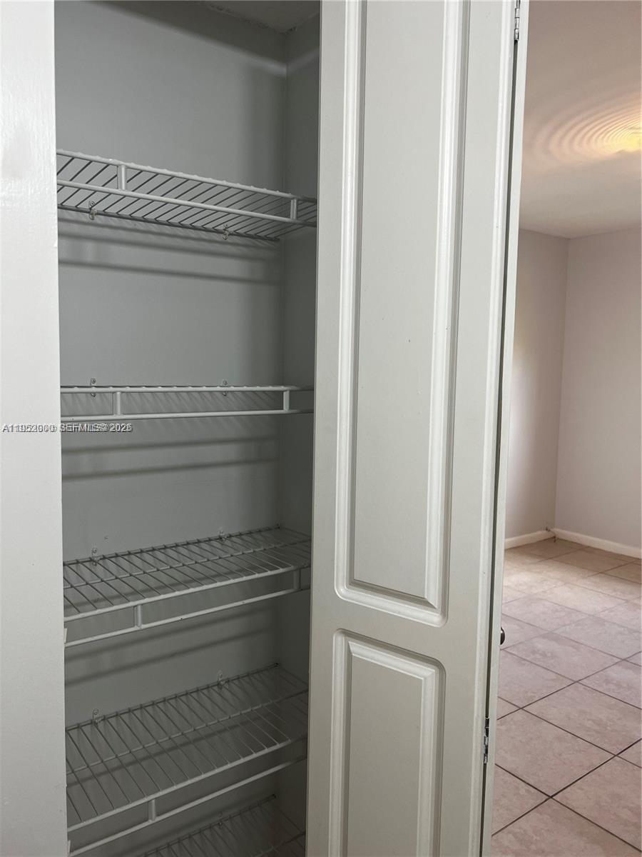 4111 Stirling Road, Unit 308 Fort Lauderdale, FL 33314 - Photo 23 of 32 a view of walk in closet