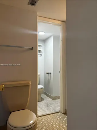 a bathroom with a toilet