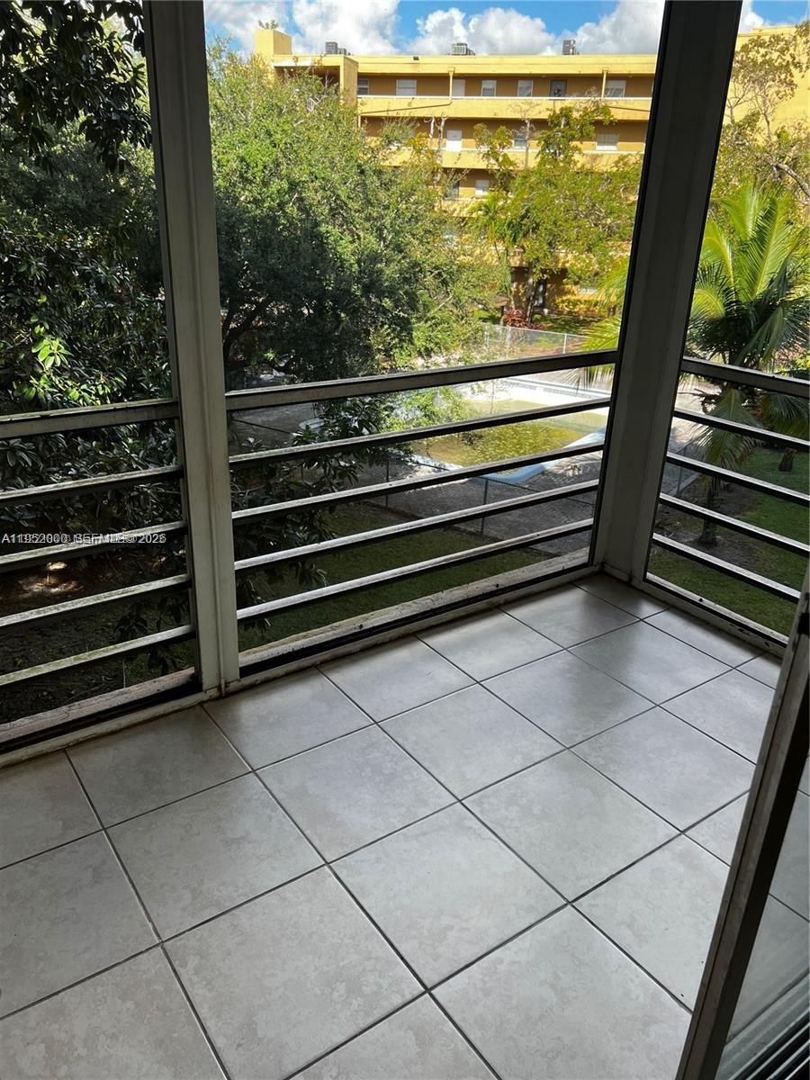 4111 Stirling Road, Unit 308 Fort Lauderdale, FL 33314 - Photo 30 of 32 a view of outdoor space with seating area