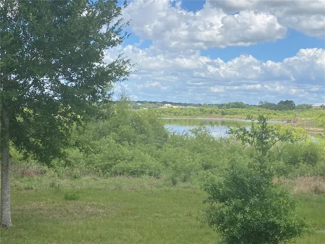 a view of a deck with a yard