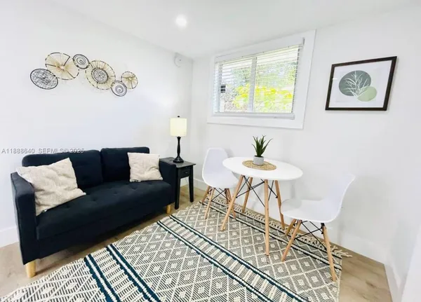 a living room with a couch and a table