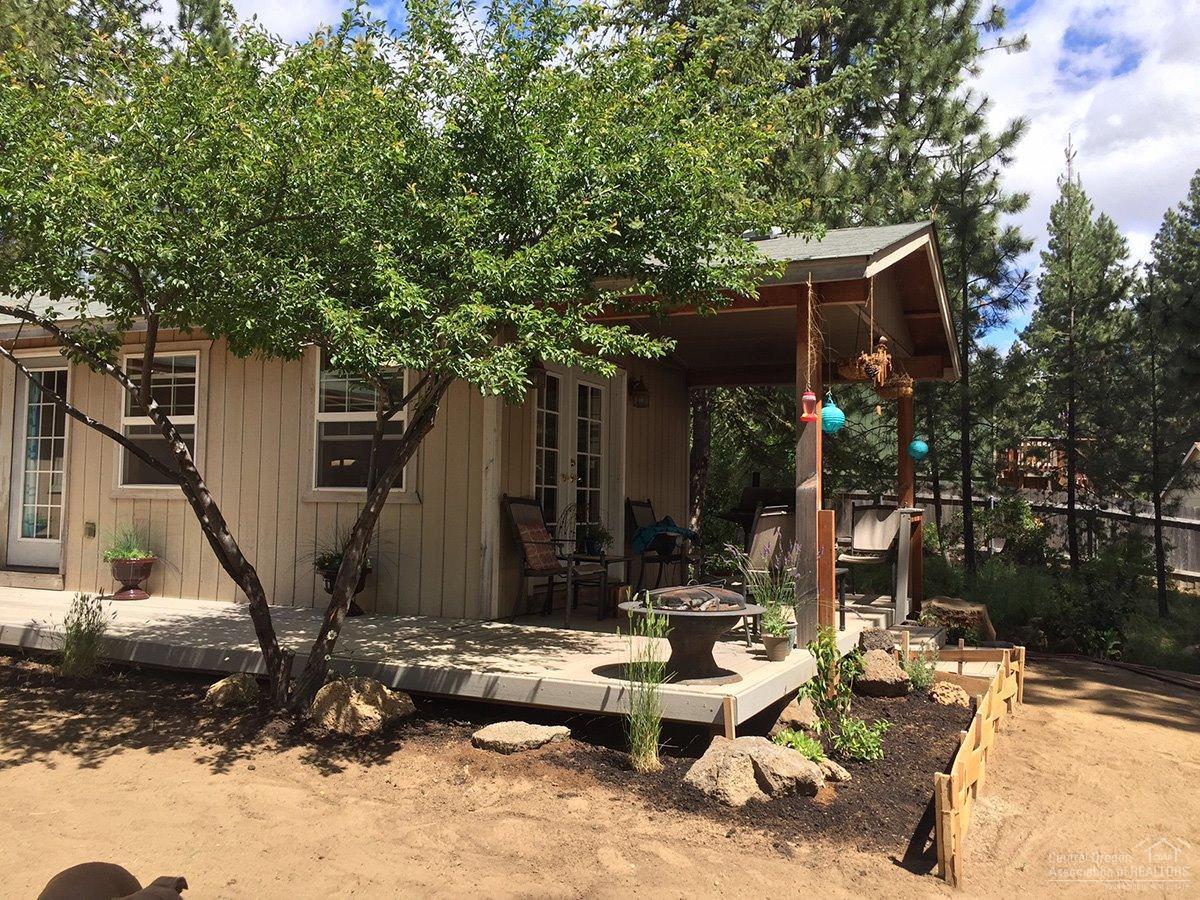 59968 Hopi Road Bend, OR 97702 - Photo 8 of 12 a view of backyard of house with outdoor seating