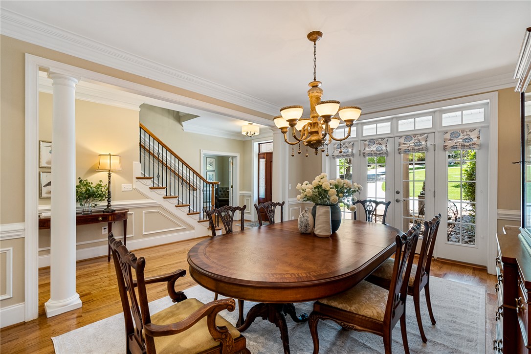 200 Graylyn Drive Anderson, SC 29621 - Photo 5 of 48 Hardwood floors and French doors illuminate a gracious dining room, perfect for entertaining.