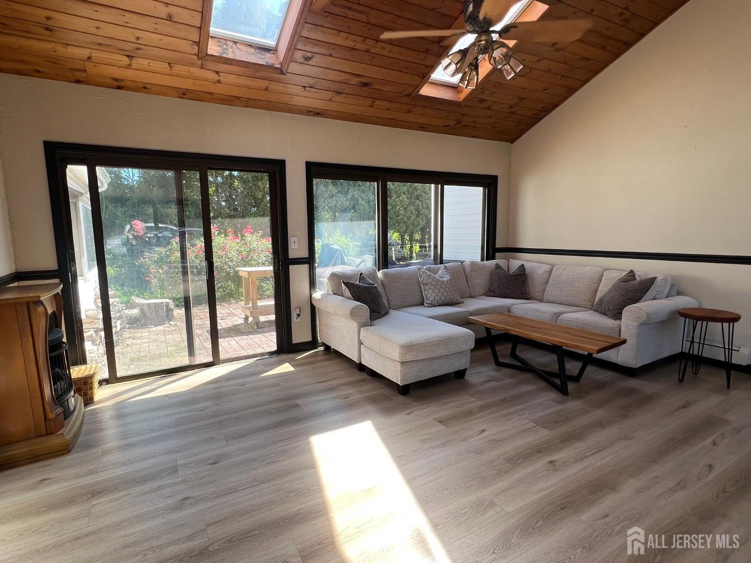 265 Friendship Road Cranbury, NJ 08512 - Photo 4 of 15 a living room with furniture and a large window