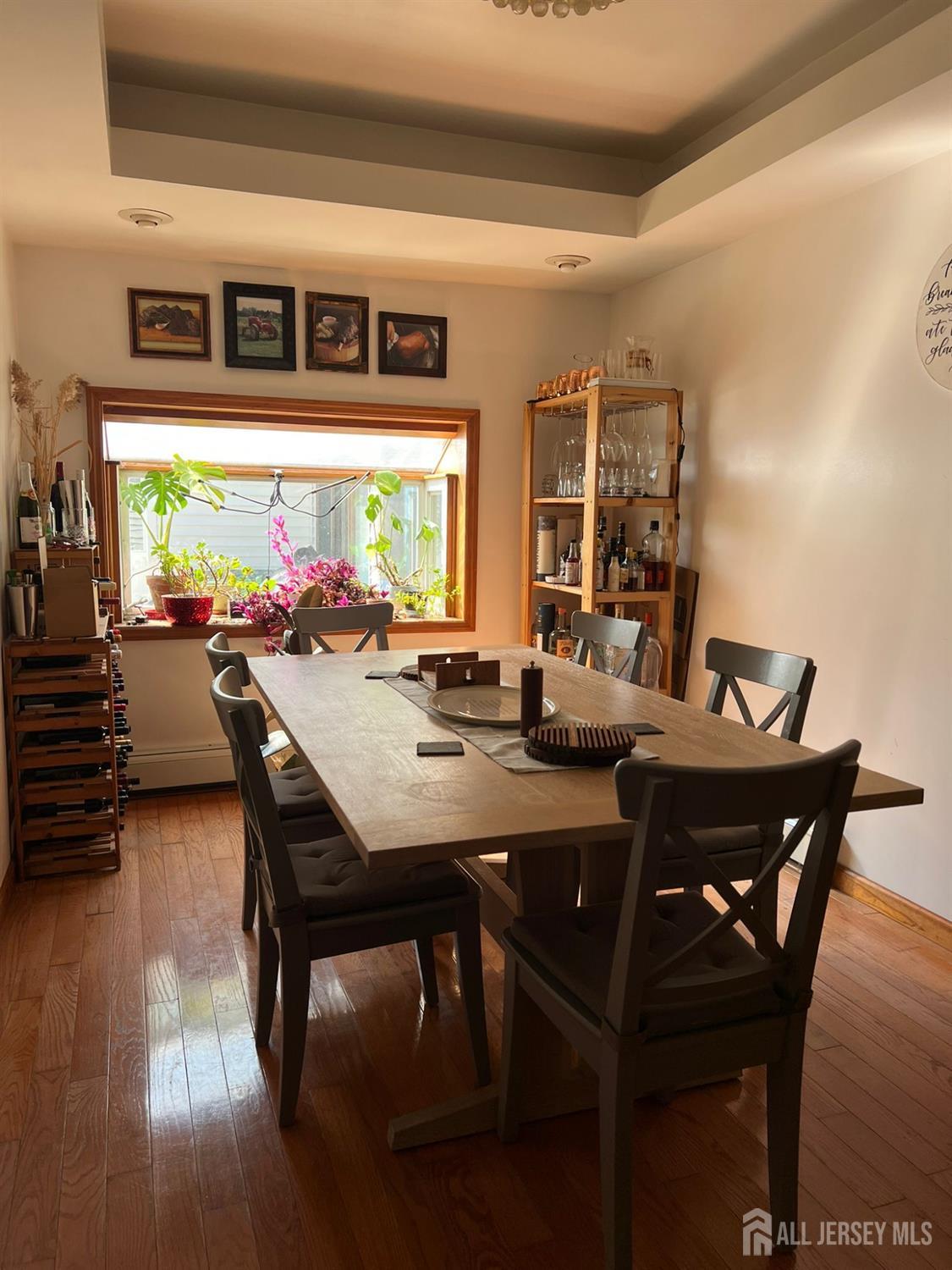 265 Friendship Road Cranbury, NJ 08512 - Photo 6 of 15 a view of a dining room with furniture and wooden floor