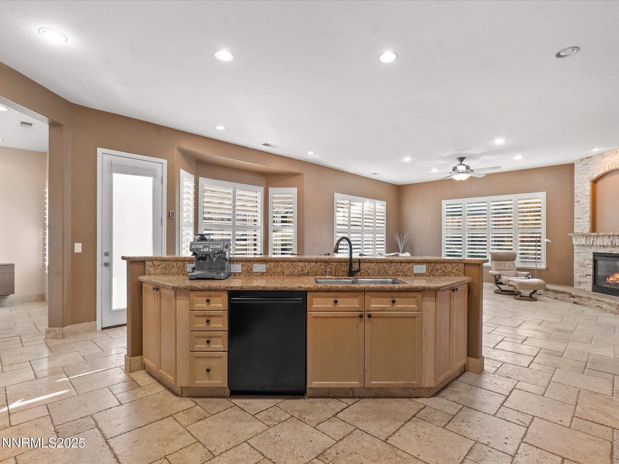 5519 New Mexico Court Reno, NV 89511 - Photo 21 of 60 a kitchen with a sink and cabinets