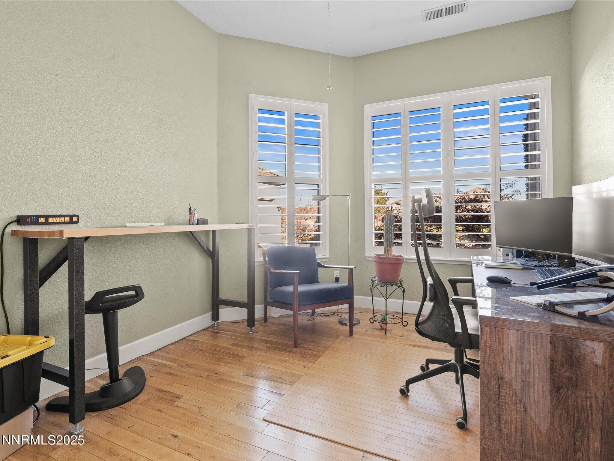 5519 New Mexico Court Reno, NV 89511 - Photo 33 of 60 a view of a workspace with furniture and a window