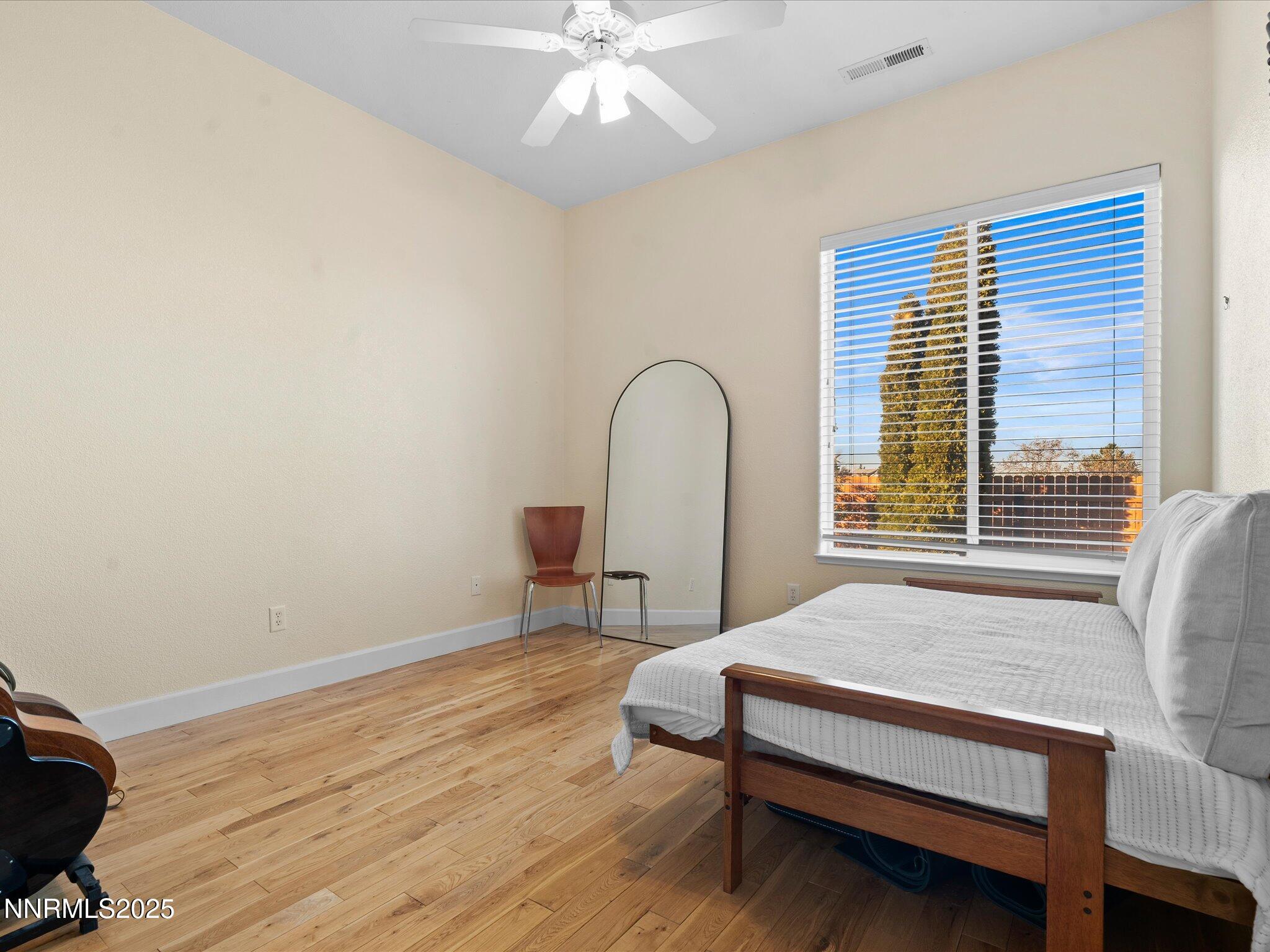 5519 New Mexico Court Reno, NV 89511 - Photo 36 of 60 a living room with furniture and a window