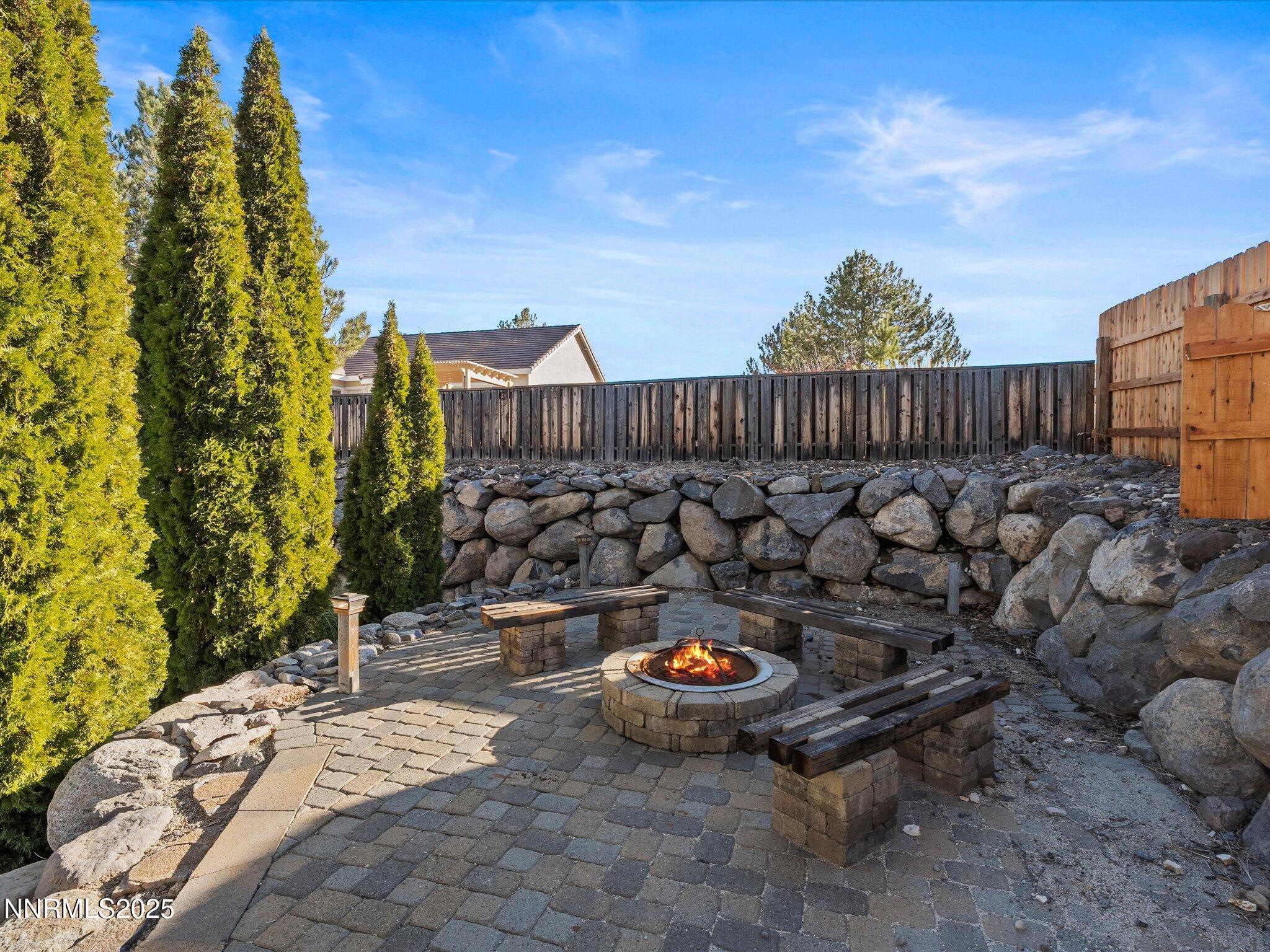 5519 New Mexico Court Reno, NV 89511 - Photo 43 of 60 a view of a back yard of the house and cars parked