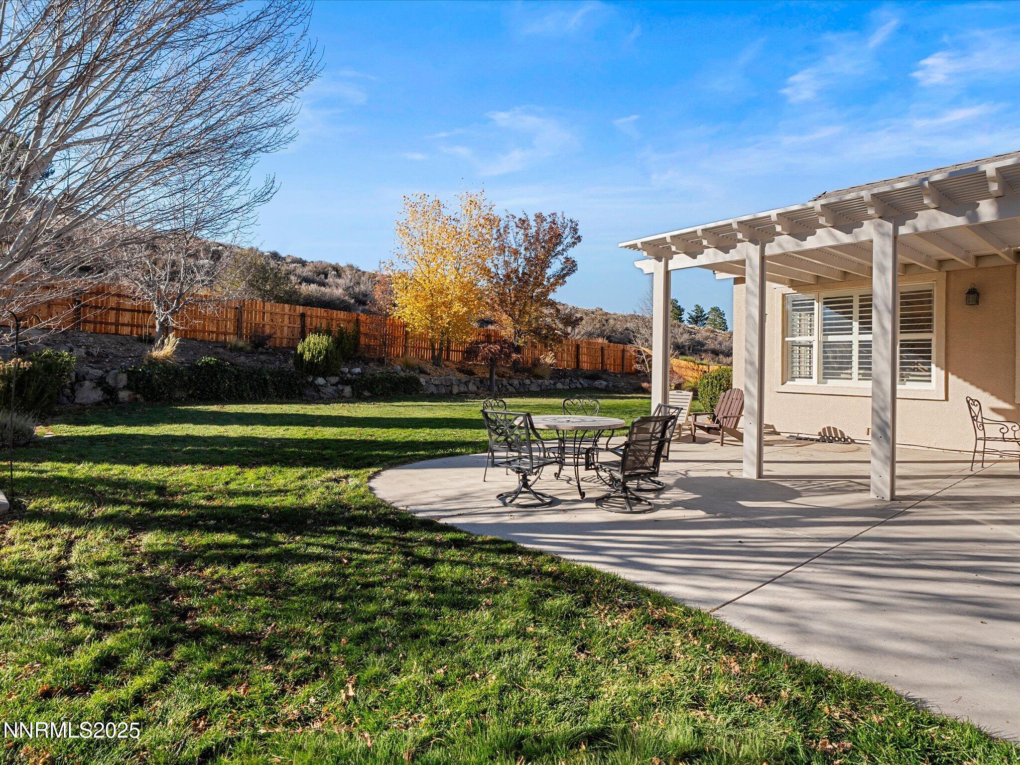 5519 New Mexico Court Reno, NV 89511 - Photo 46 of 60 a view of a house with backyard and sitting area