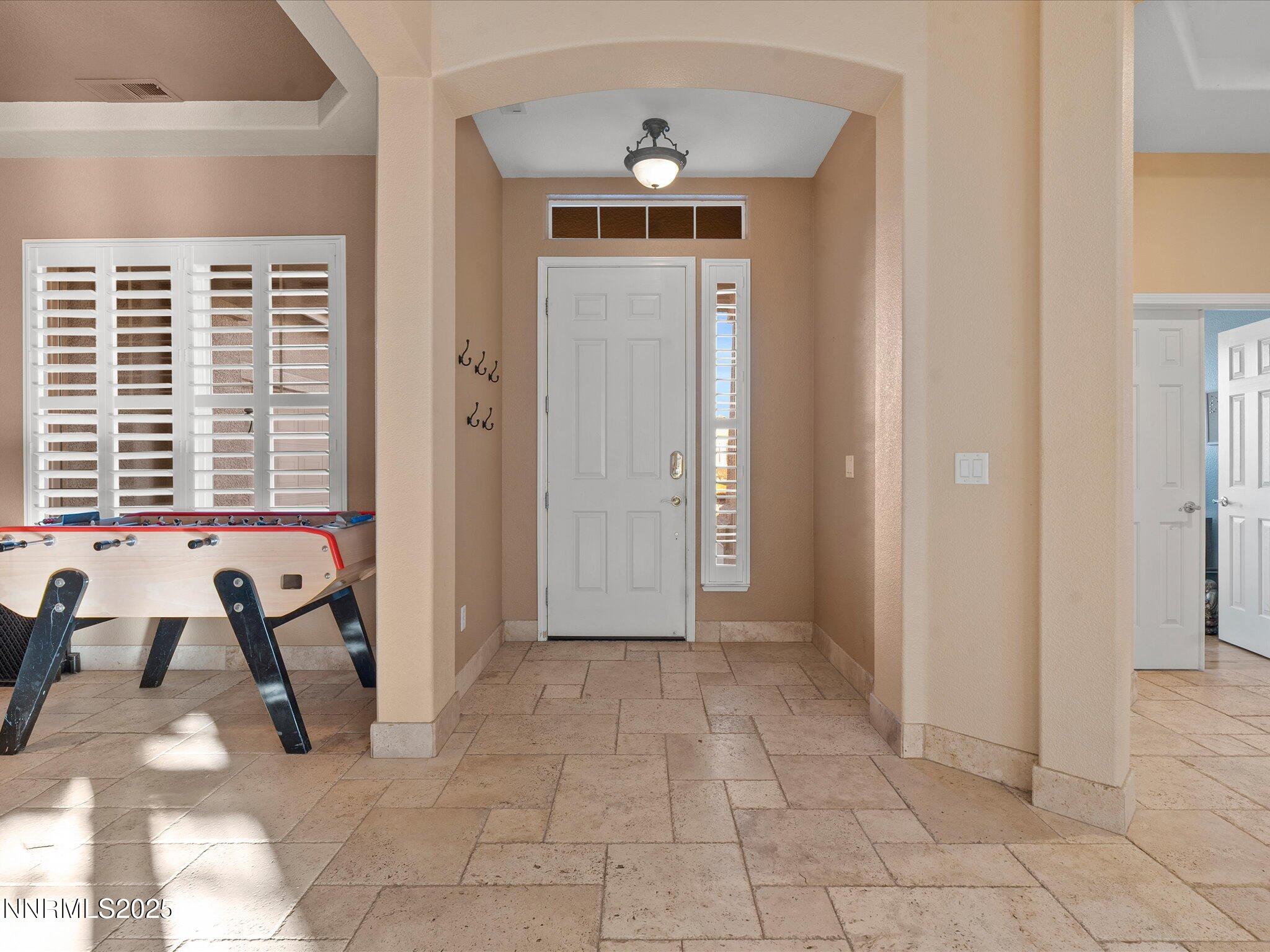 5519 New Mexico Court Reno, NV 89511 - Photo 5 of 60 a view of a livingroom with a furniture and windows