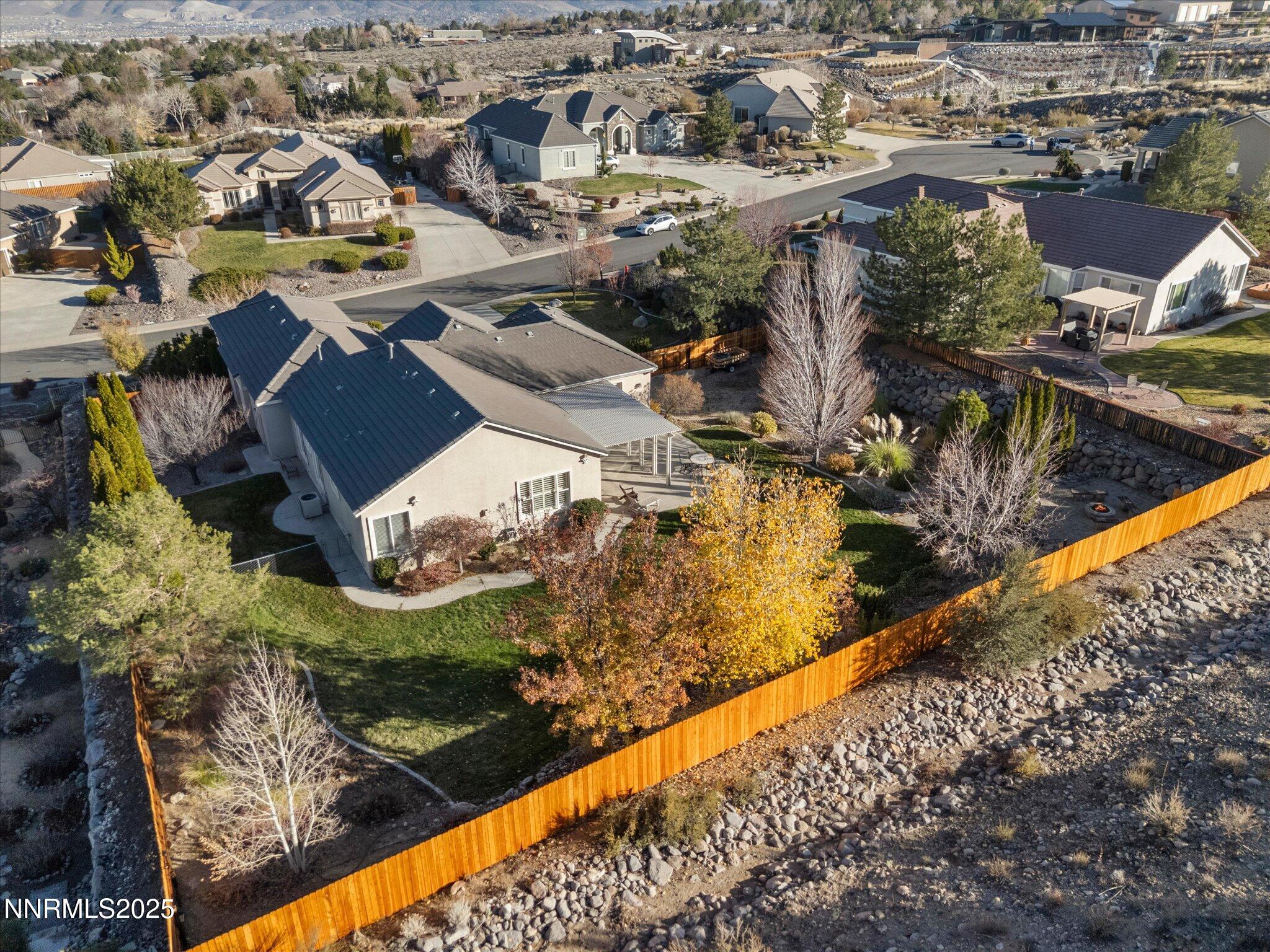 5519 New Mexico Court Reno, NV 89511 - Photo 51 of 60 an aerial view of residential houses with outdoor space