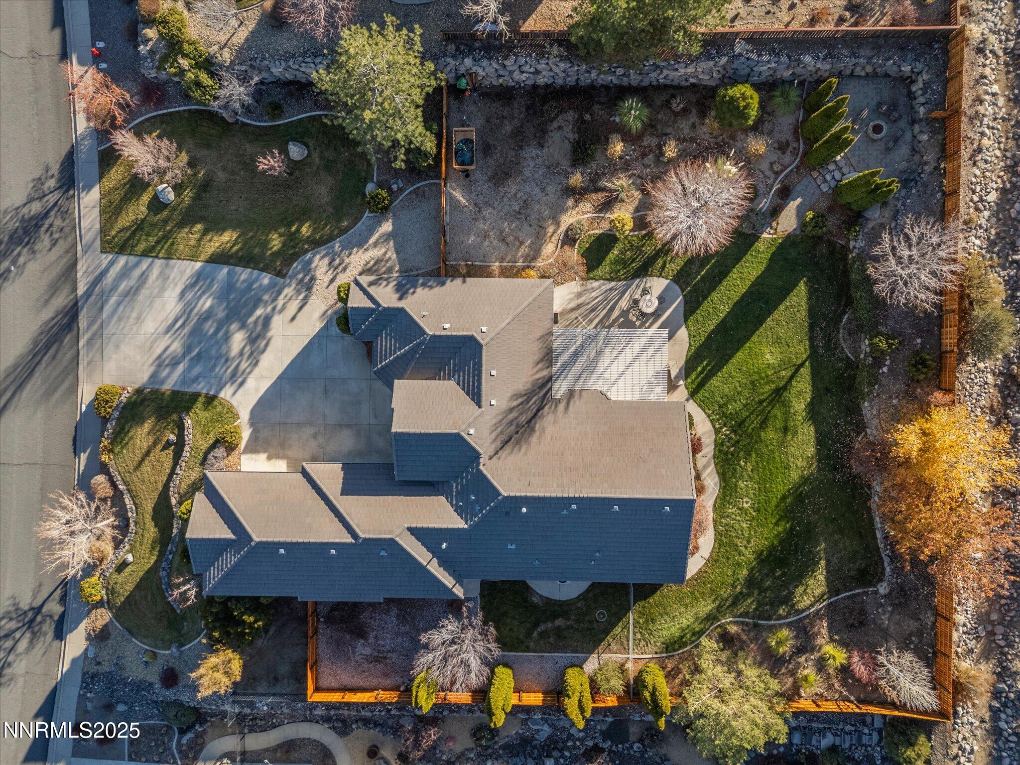5519 New Mexico Court Reno, NV 89511 - Photo 54 of 60 an aerial view of a house with a yard
