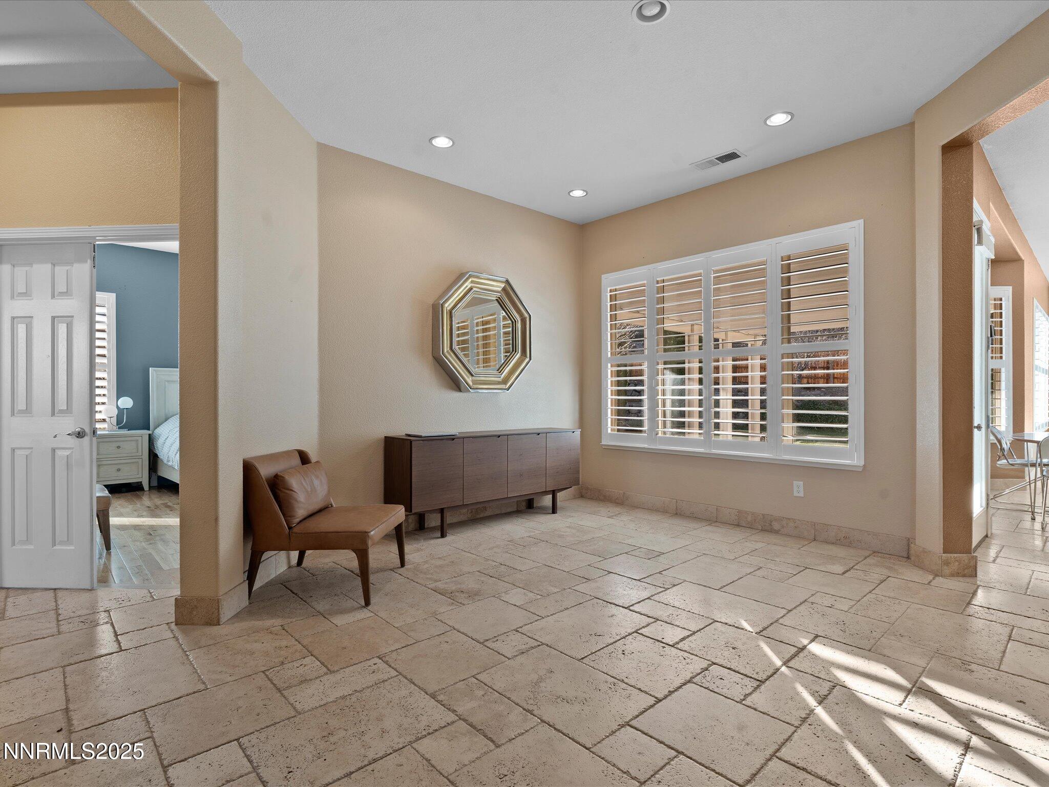 5519 New Mexico Court Reno, NV 89511 - Photo 7 of 60 a view of an empty room with a window