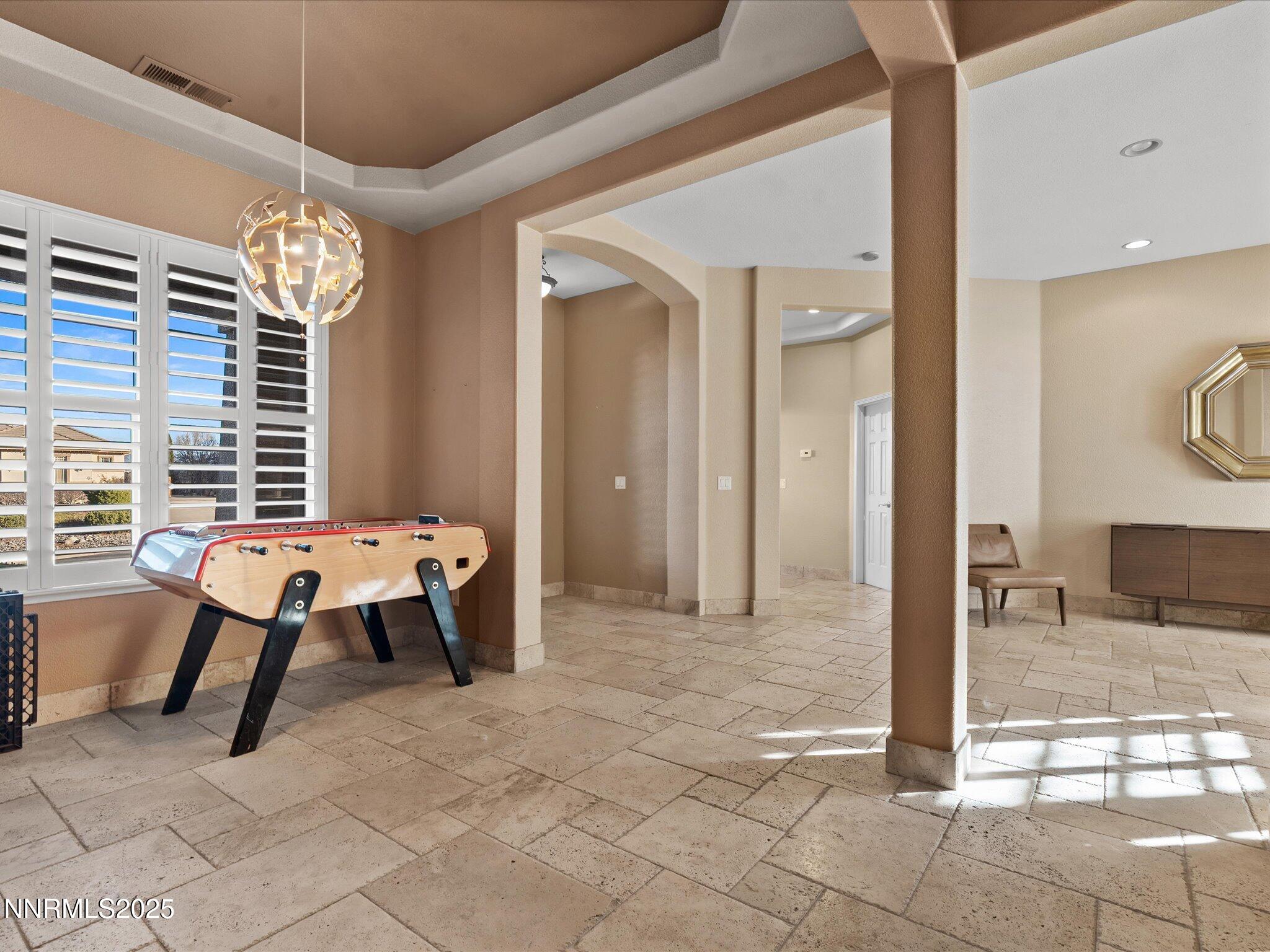 5519 New Mexico Court Reno, NV 89511 - Photo 10 of 60 a view of a livingroom with furniture and window