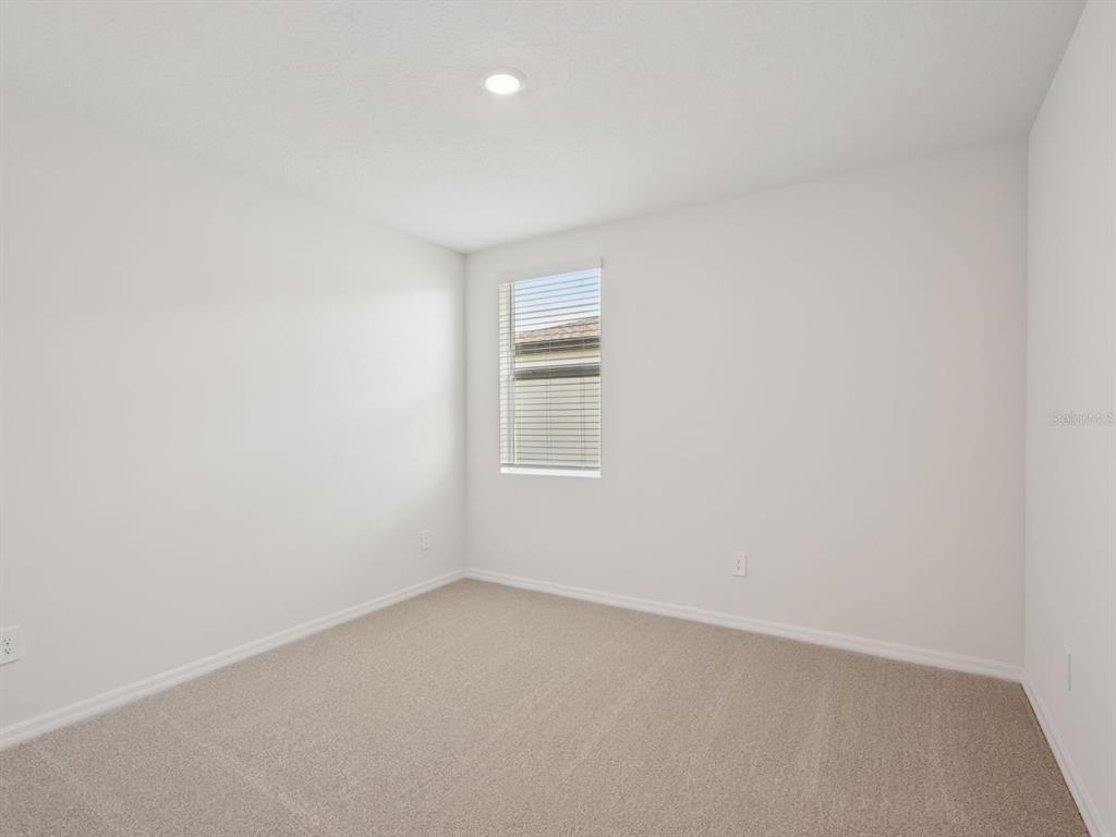 7722 Satterfield Terrace Parrish, FL 34219 - Photo 14 of 22 a view of an empty room