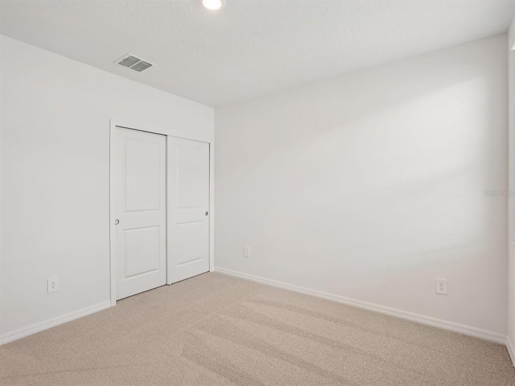7722 Satterfield Terrace Parrish, FL 34219 - Photo 15 of 22 a view of an empty room