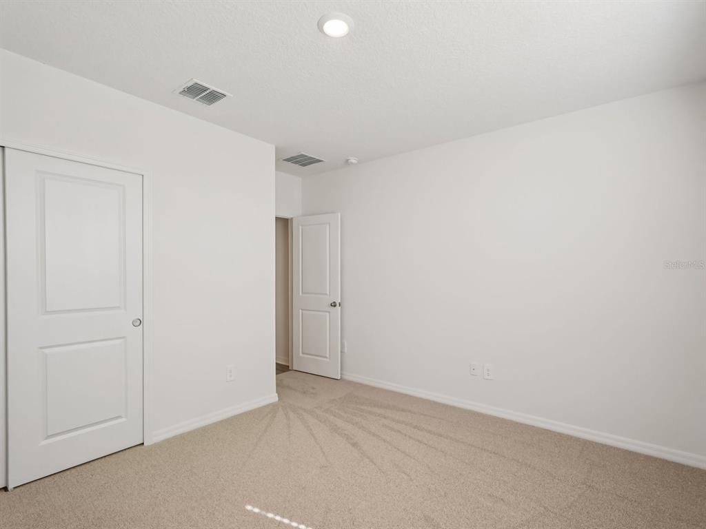 7722 Satterfield Terrace Parrish, FL 34219 - Photo 9 of 22 a view of an empty room