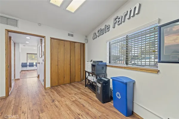 a view of workspace with wooden floor