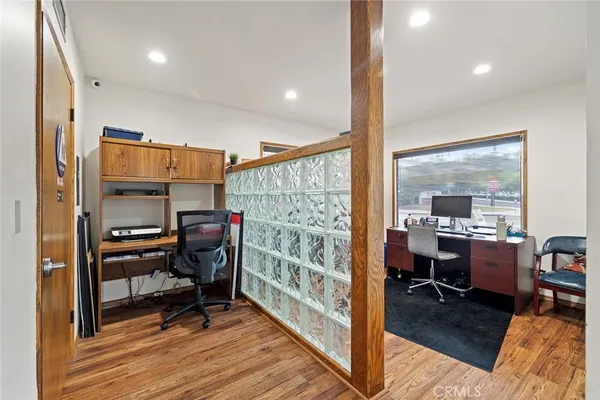a workspace with furniture and window