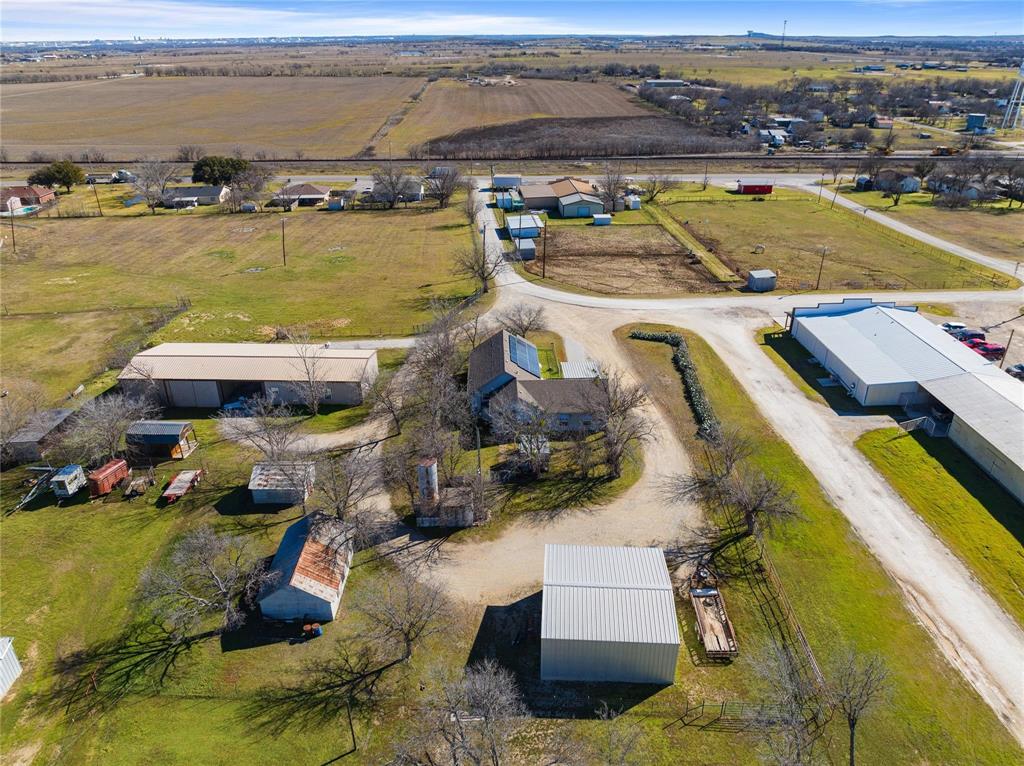 an aerial view of a house with a lake view