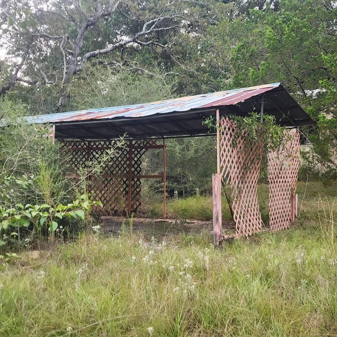 885 Patch Road DeFuniak Springs, FL 32433 - Photo 4 of 5 a view of a small yard
