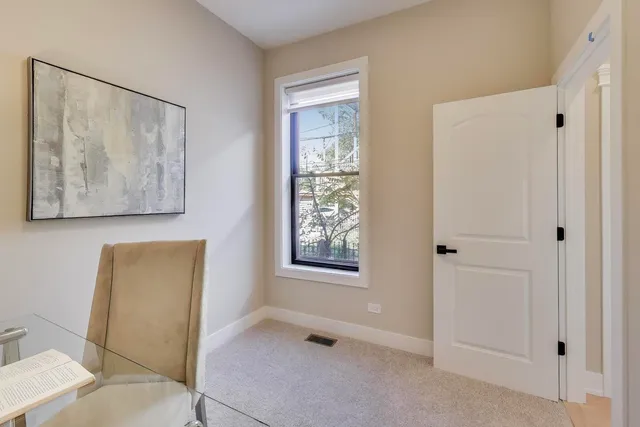 a bathroom with a shower and a window