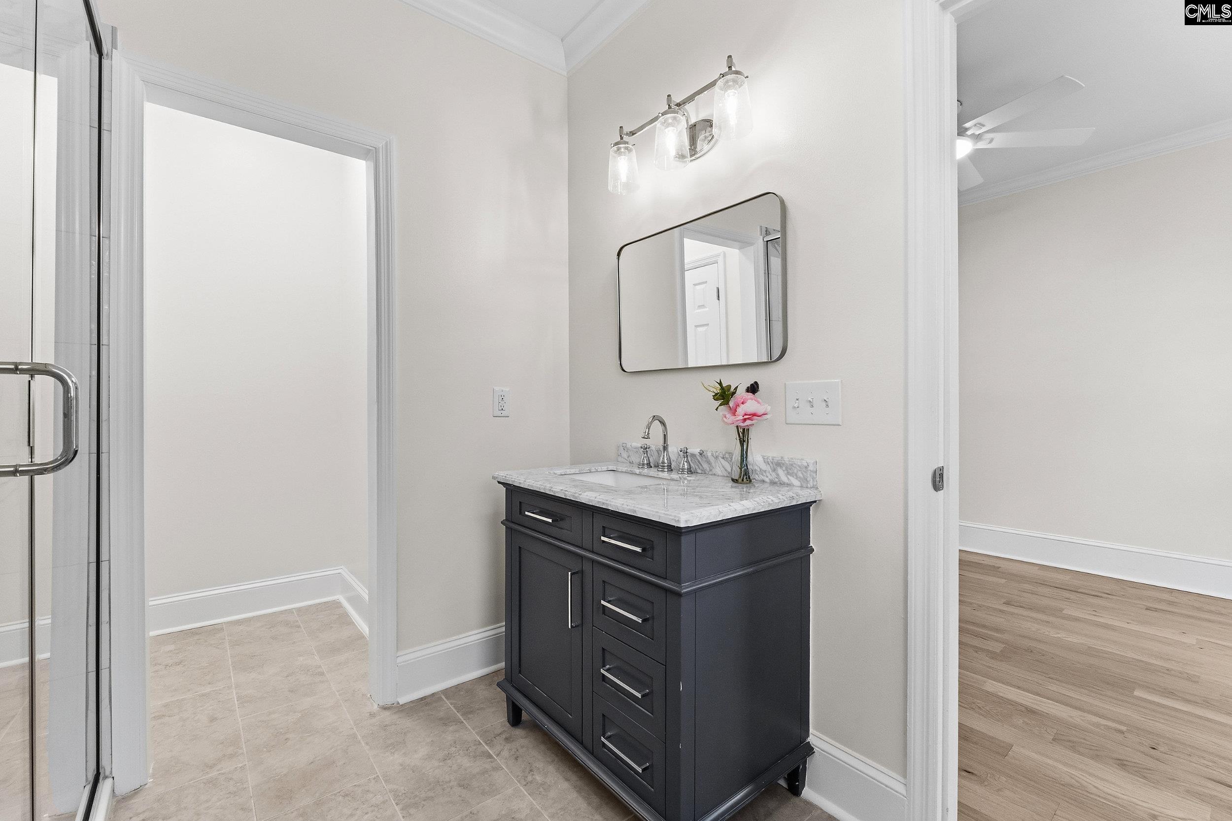 121 Silver Lake Road East Columbia, SC 29223 - Photo 30 of 57 a bathroom with a sink and a mirror