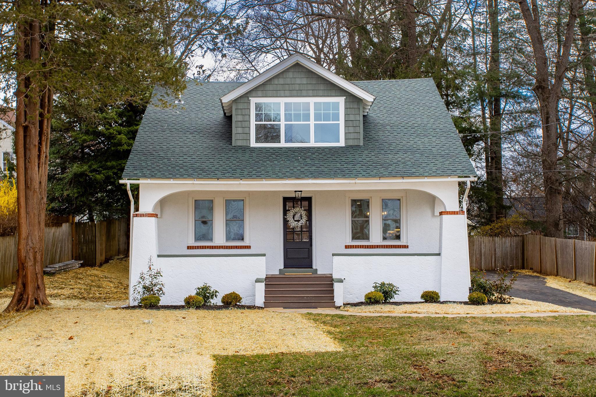 123 Sproul Road Malvern, PA 19355 - Photo 2 of 38 a front view of house with yard
