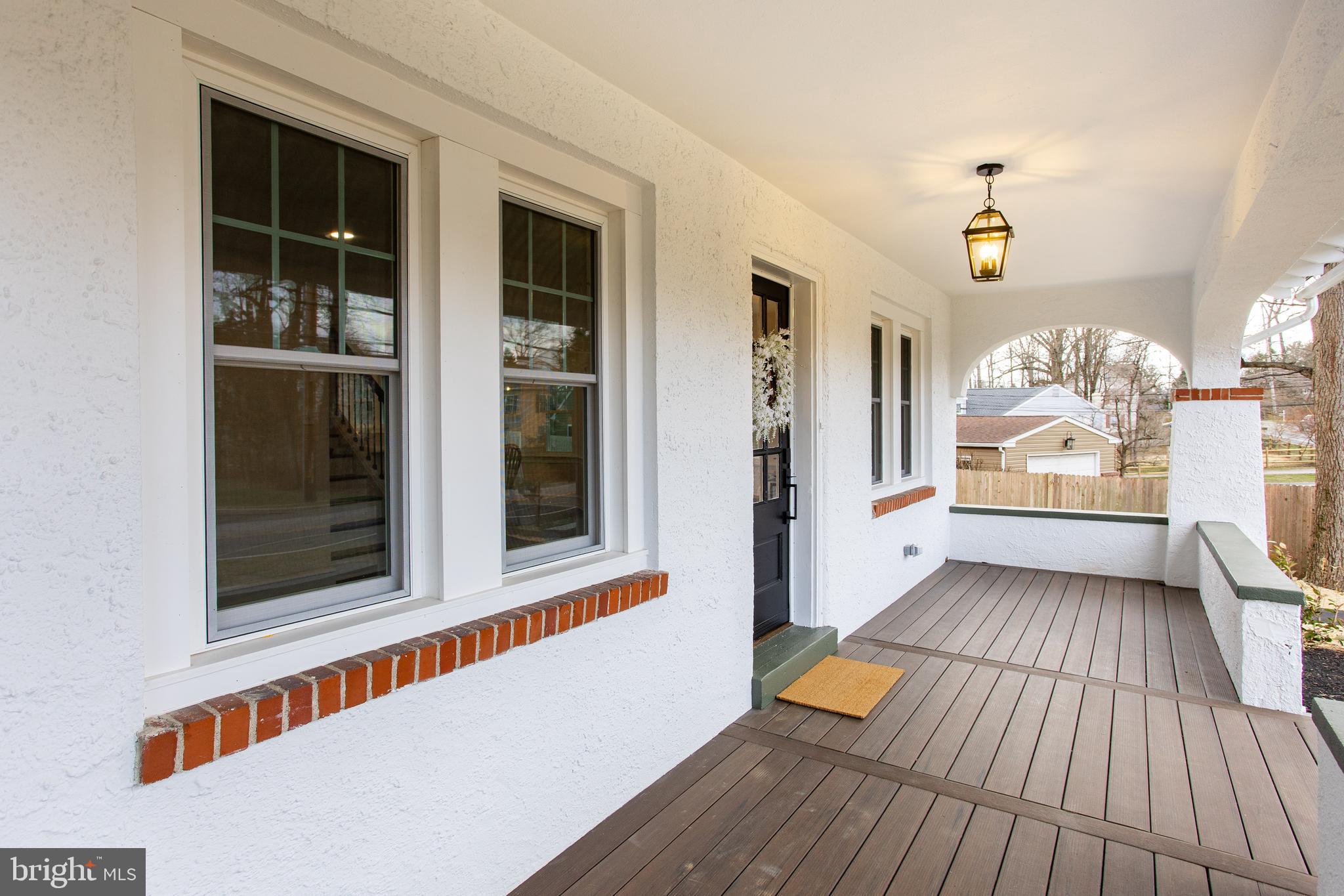 123 Sproul Road Malvern, PA 19355 - Photo 4 of 38 a view of a balcony with wooden floor and outer view