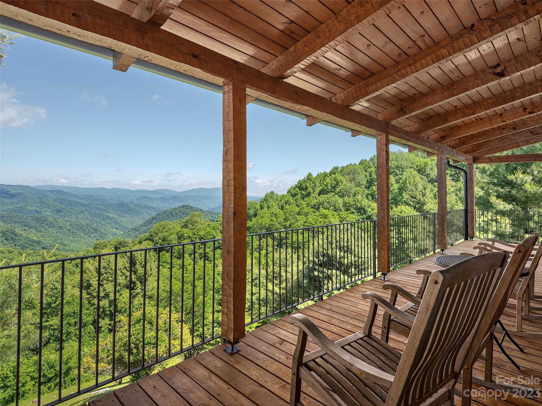 1038 Doggett Gap Road Hot Springs, NC 28743 - Photo 14 of 32 a view of two chairs in the balcony