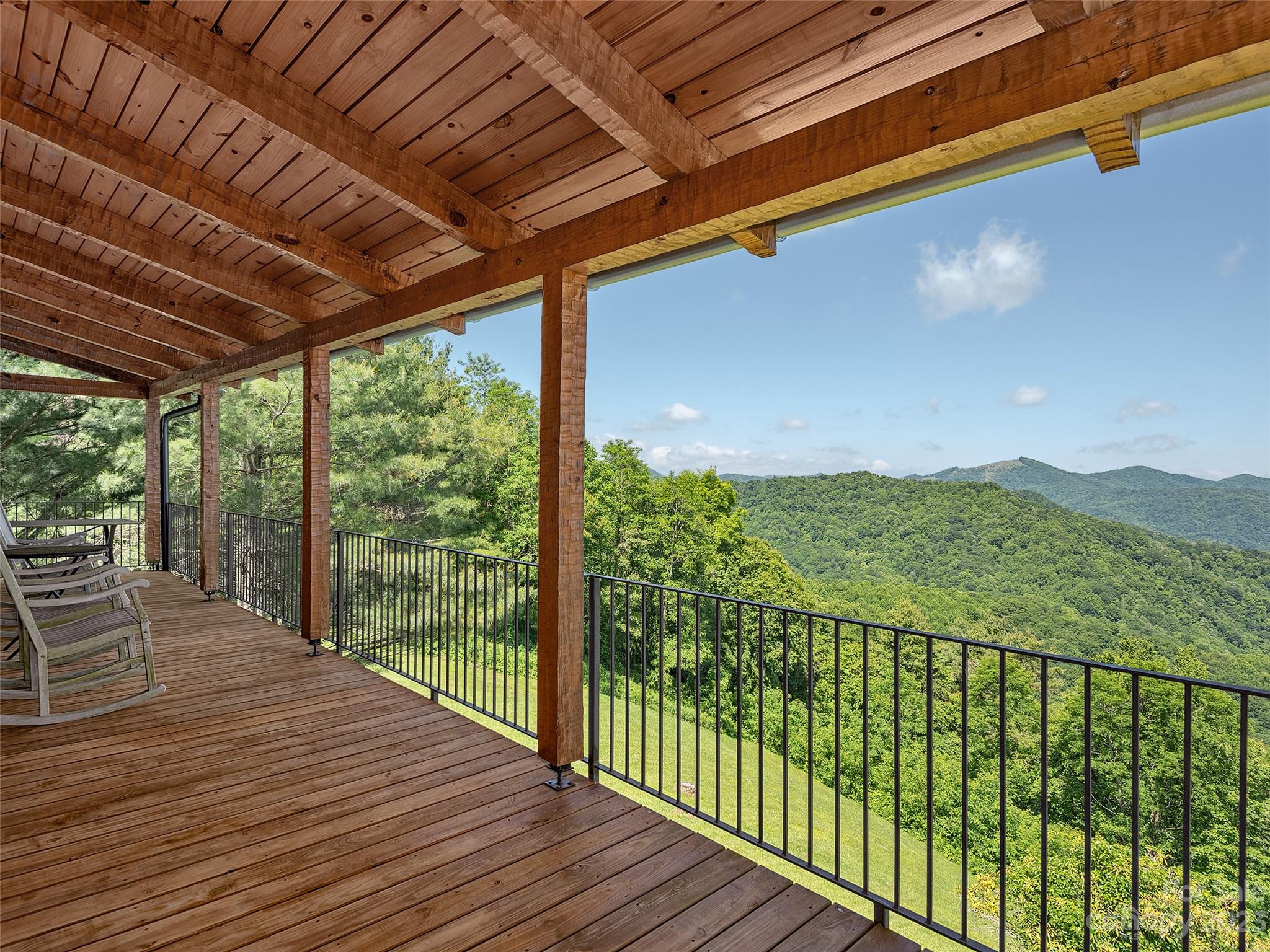 1038 Doggett Gap Road Hot Springs, NC 28743 - Photo 15 of 32 a view of balcony with wooden floor
