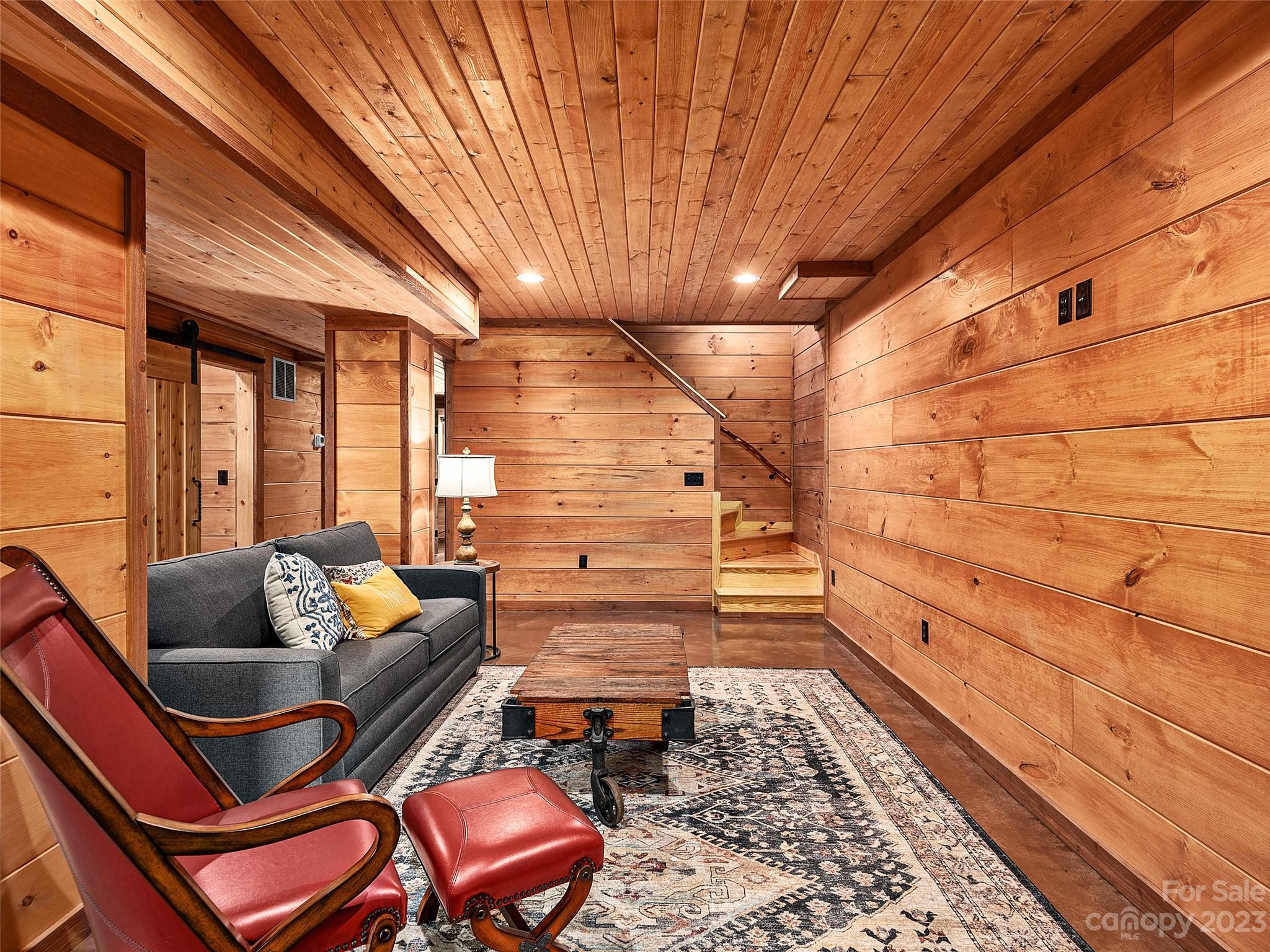 1038 Doggett Gap Road Hot Springs, NC 28743 - Photo 21 of 32 a backyard of a house with seating space