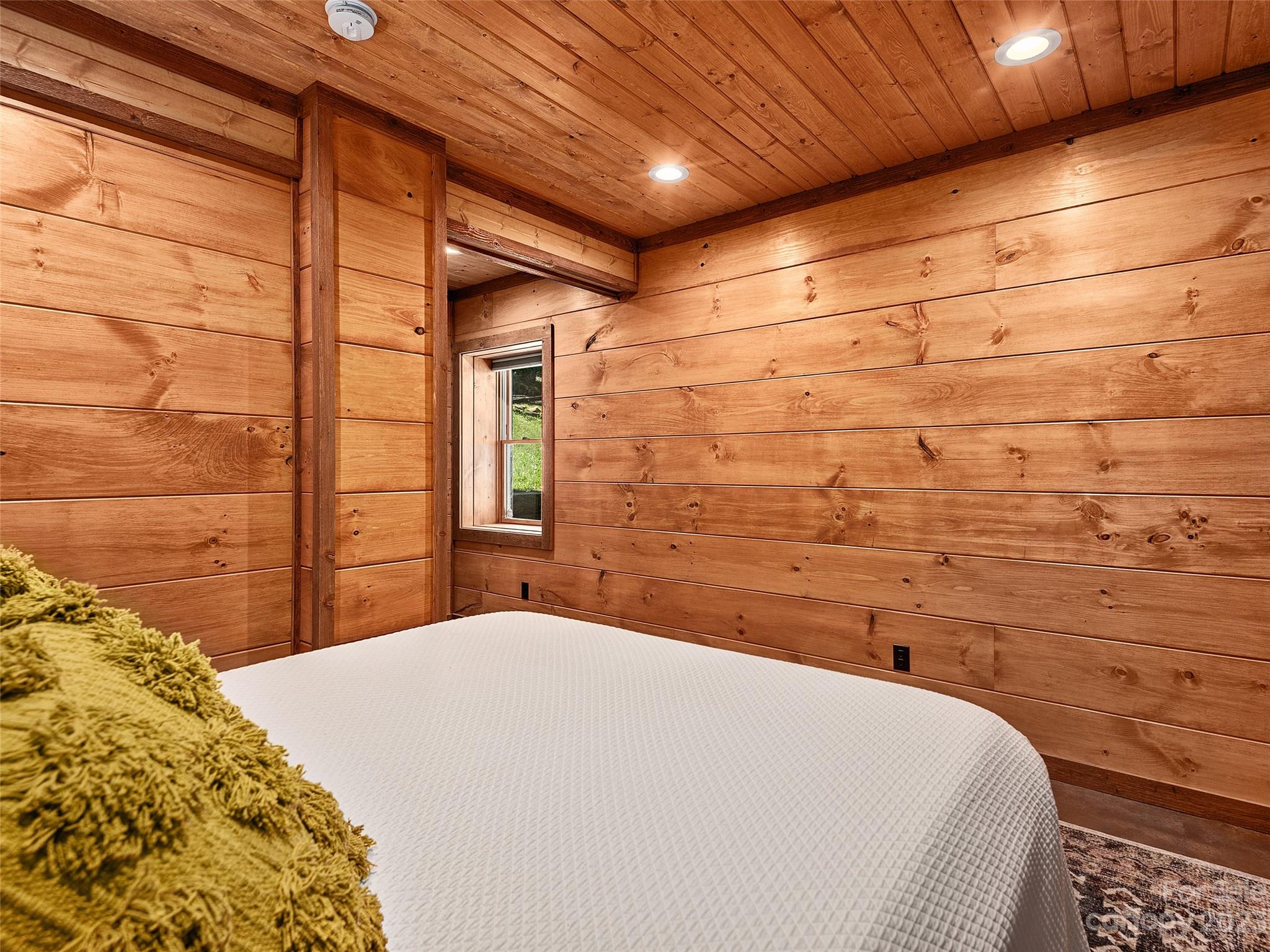 1038 Doggett Gap Road Hot Springs, NC 28743 - Photo 24 of 32 a bathroom with a sink and a shower