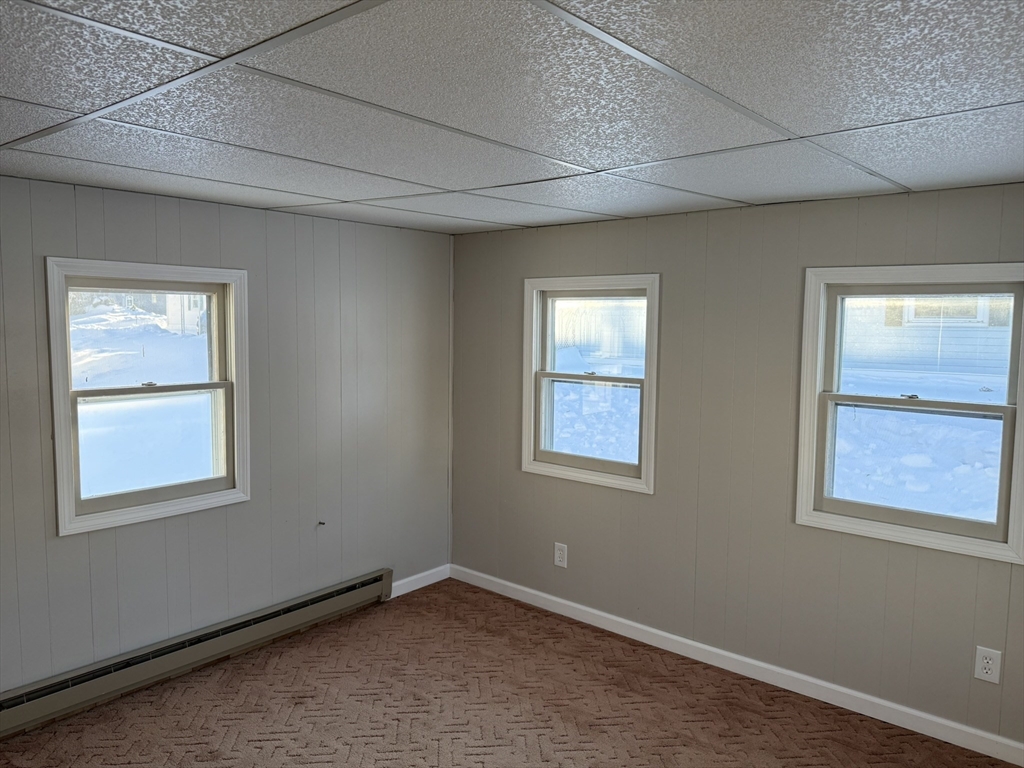281 Chauncey Walker Street, Unit 188 Belchertown, MA 01007 - Photo 16 of 19 an empty room with a window