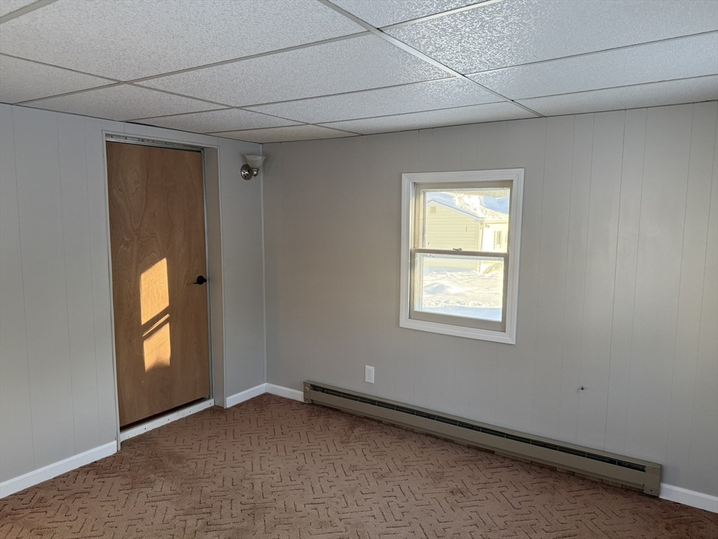281 Chauncey Walker Street, Unit 188 Belchertown, MA 01007 - Photo 17 of 19 an empty room with windows