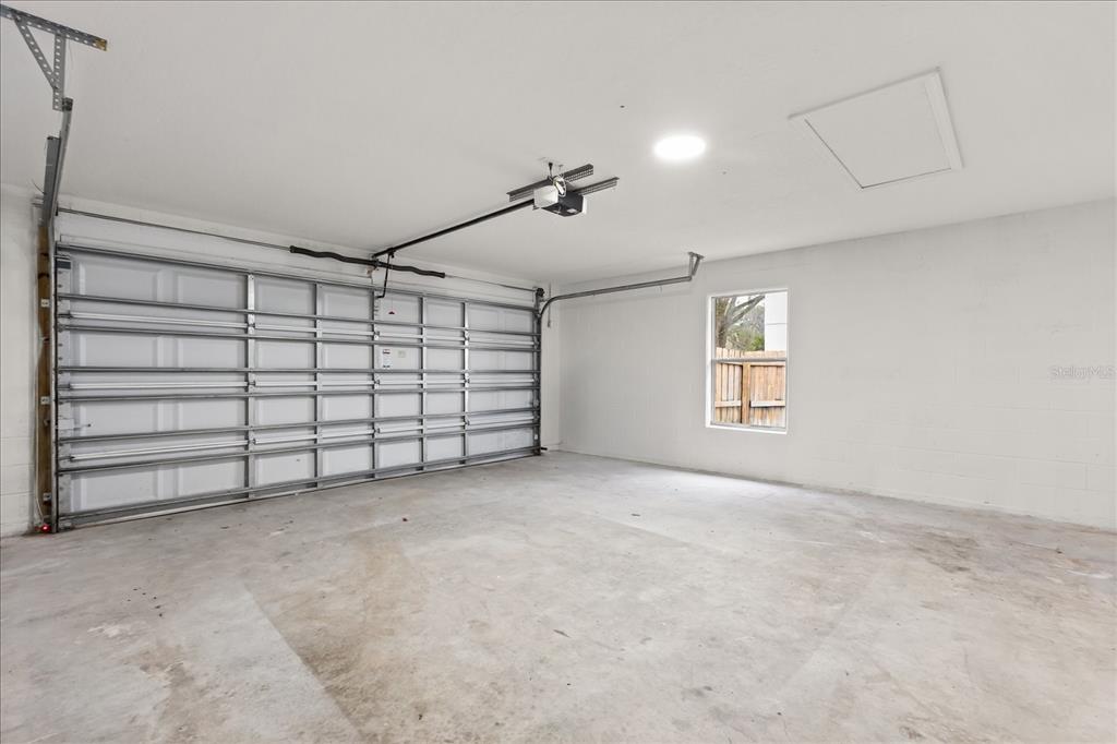 619 Rhodes Drive DeLand, FL 32720 - Photo 14 of 37 a view of a garage