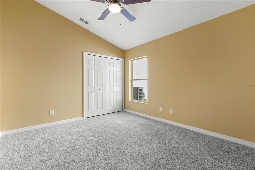 619 Rhodes Drive DeLand, FL 32720 - Photo 31 of 37 a view of an empty room with a window