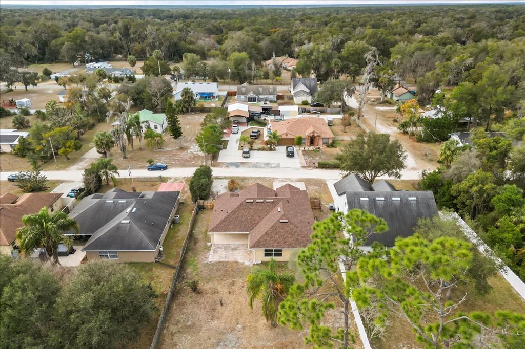 619 Rhodes Drive DeLand, FL 32720 - Photo 36 of 37 an aerial view of residential houses with outdoor space