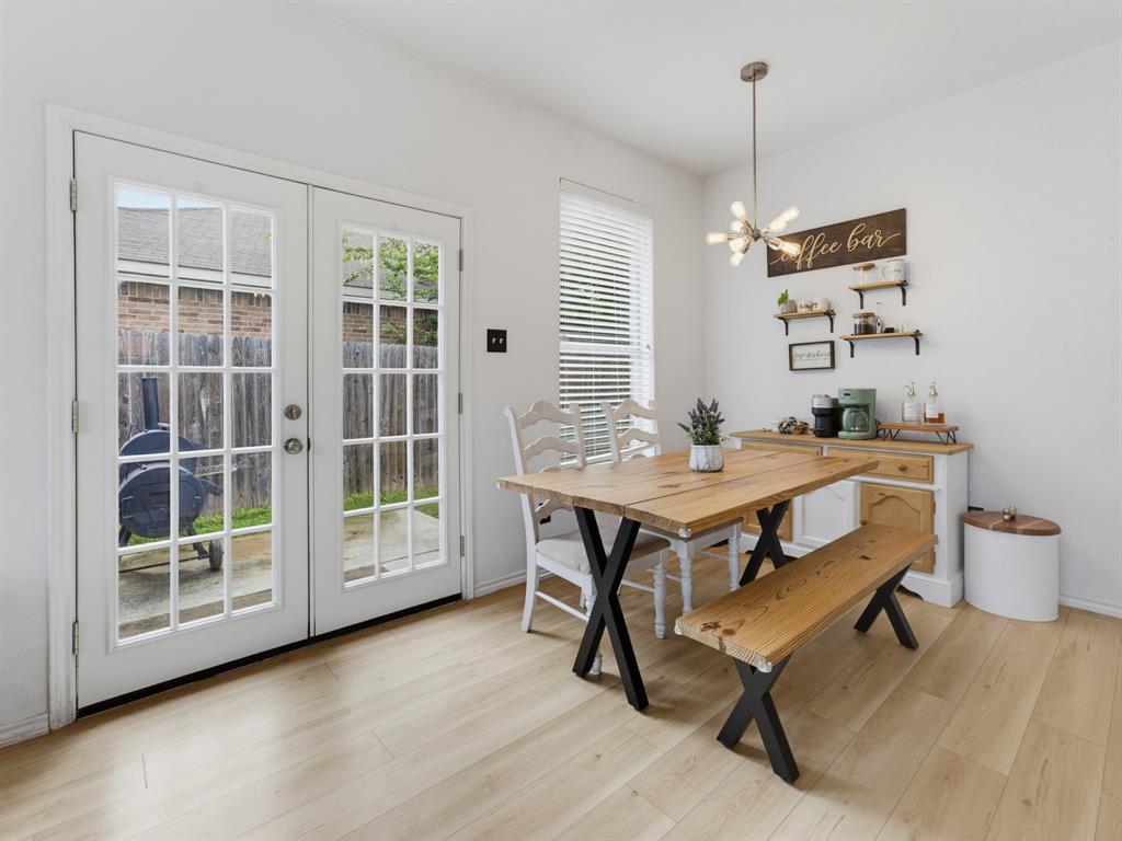 600 Stirling Road Rhome, TX 76078 - Photo 14 of 38 Bright dining space featuring light wood-finish flooring and white walls