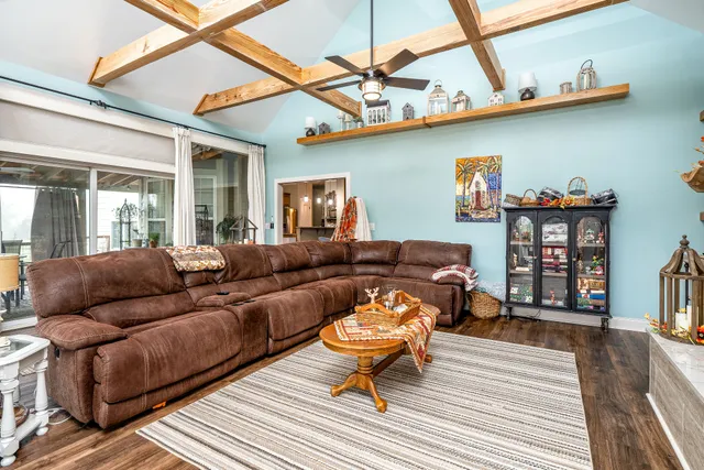a bathroom with a granite countertop double vanity sink and a mirror