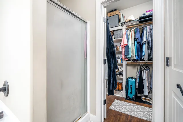 a building outdoor space with patio furniture and potted plants