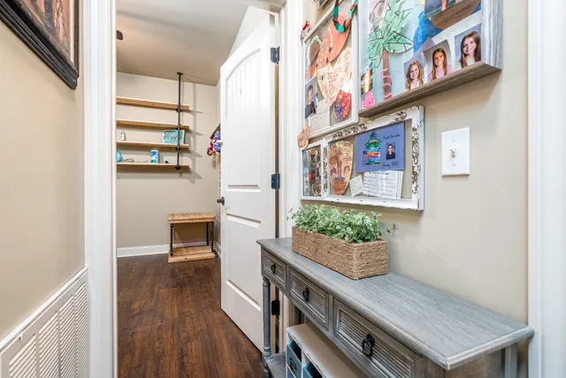 a front view of a house with a yard table and chairs