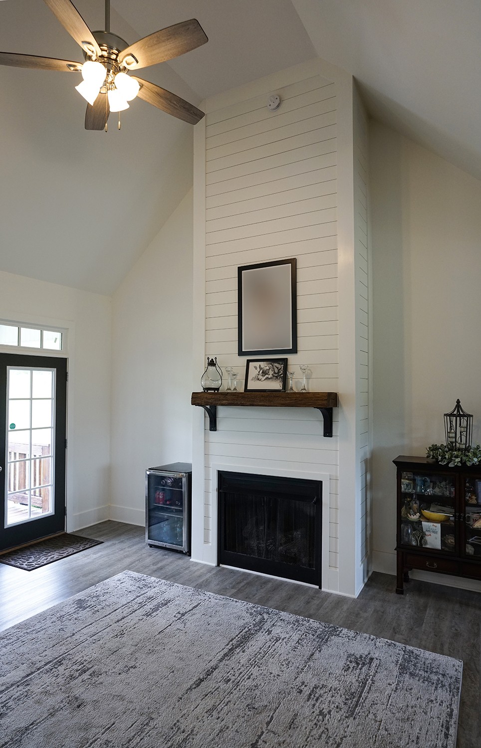124 Piney Road Dickson, TN 37055 - Photo 21 of 39 a view of empty room with fireplace and fan
