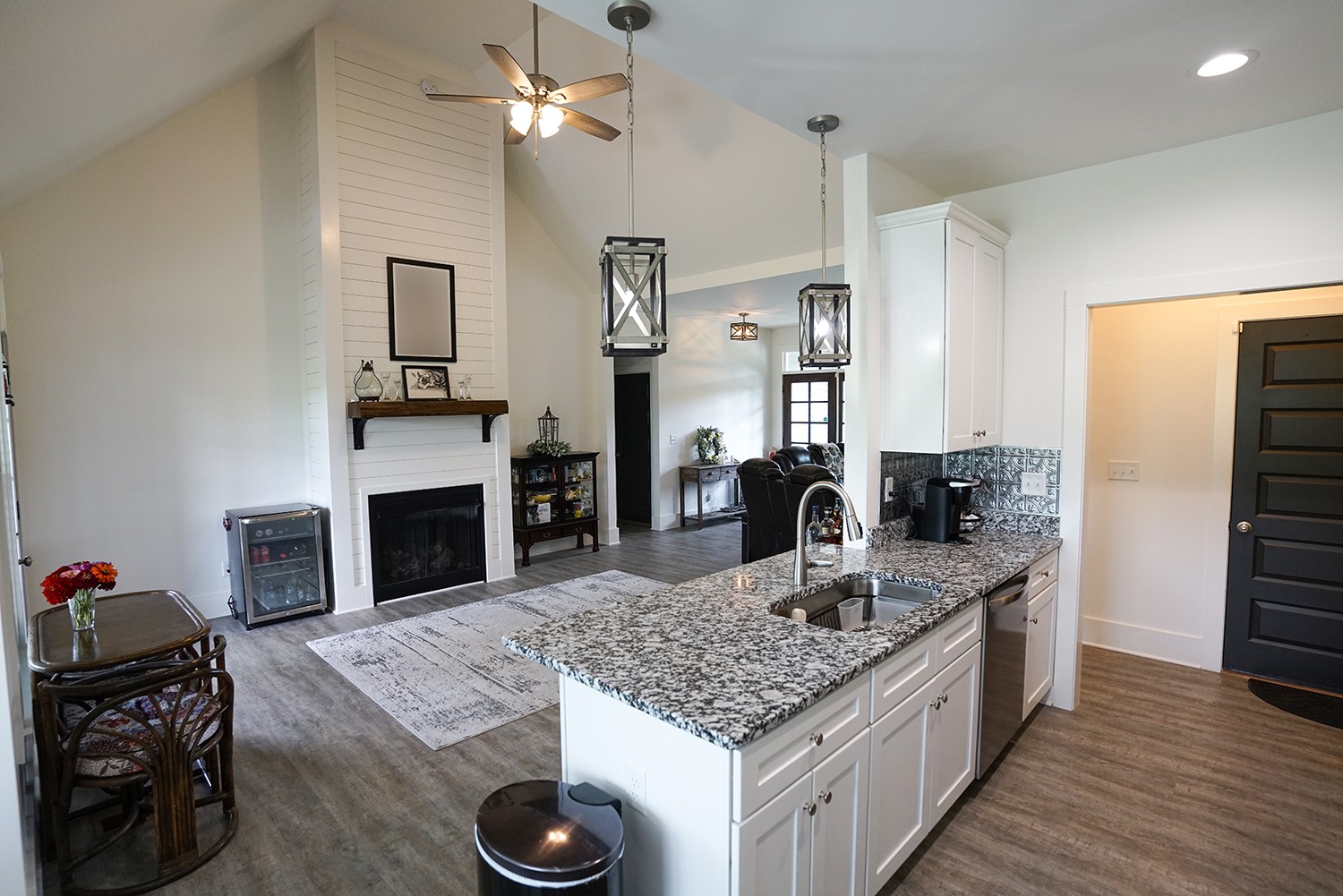 124 Piney Road Dickson, TN 37055 - Photo 23 of 39 a kitchen with kitchen island granite countertop a sink appliances and cabinets
