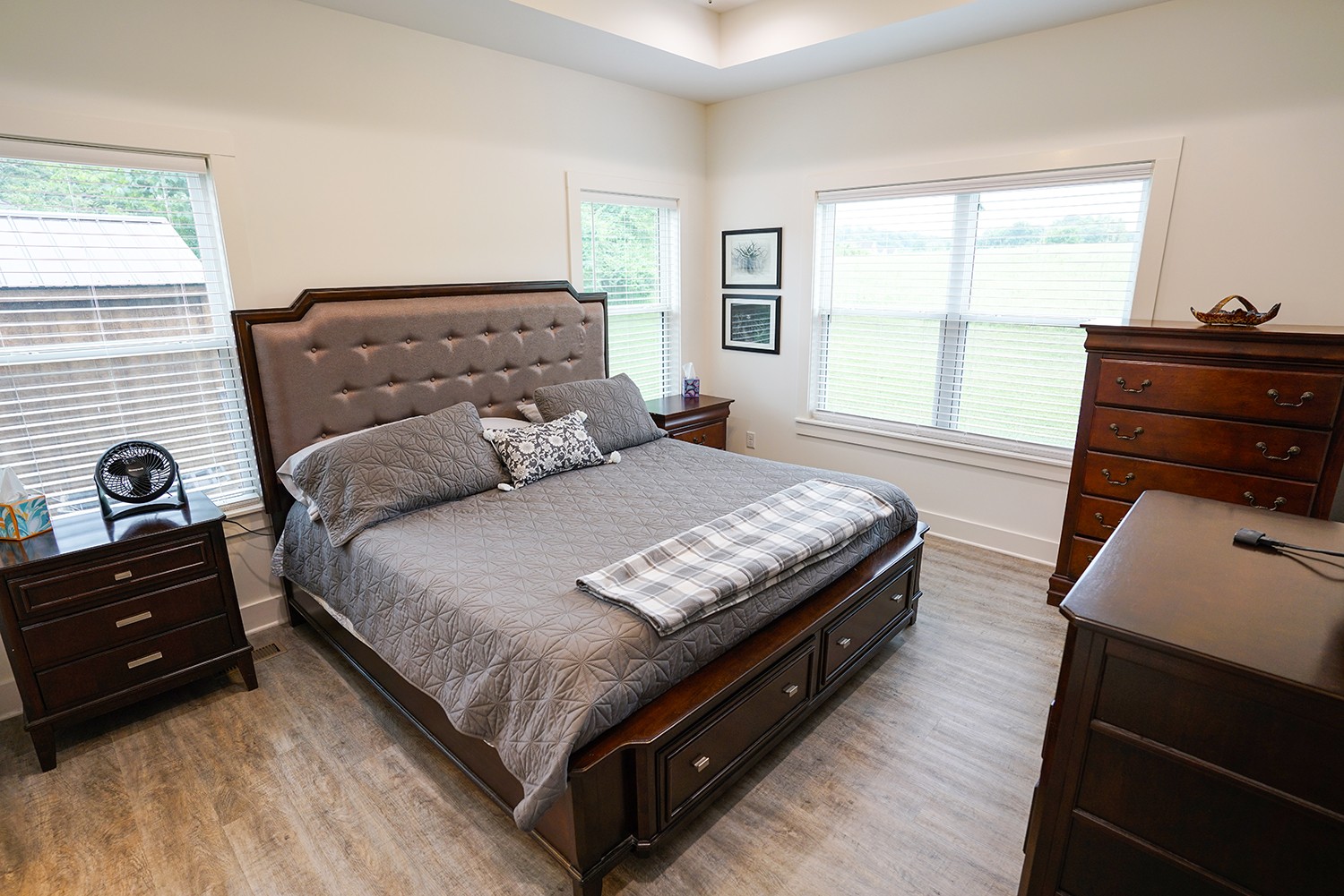 124 Piney Road Dickson, TN 37055 - Photo 26 of 39 a bedroom with a bed and a dresser