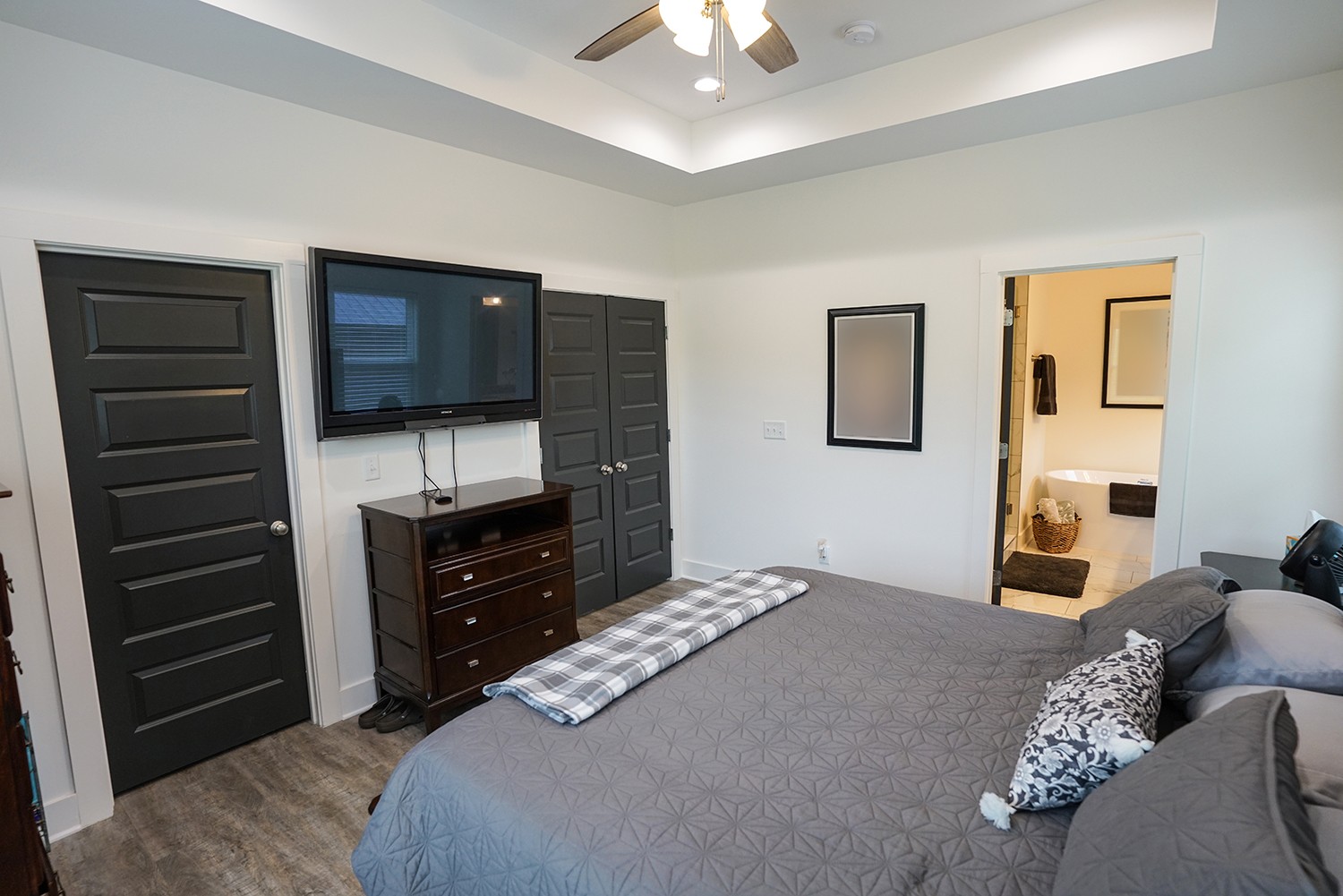 124 Piney Road Dickson, TN 37055 - Photo 28 of 39 a bedroom with a bed and a television