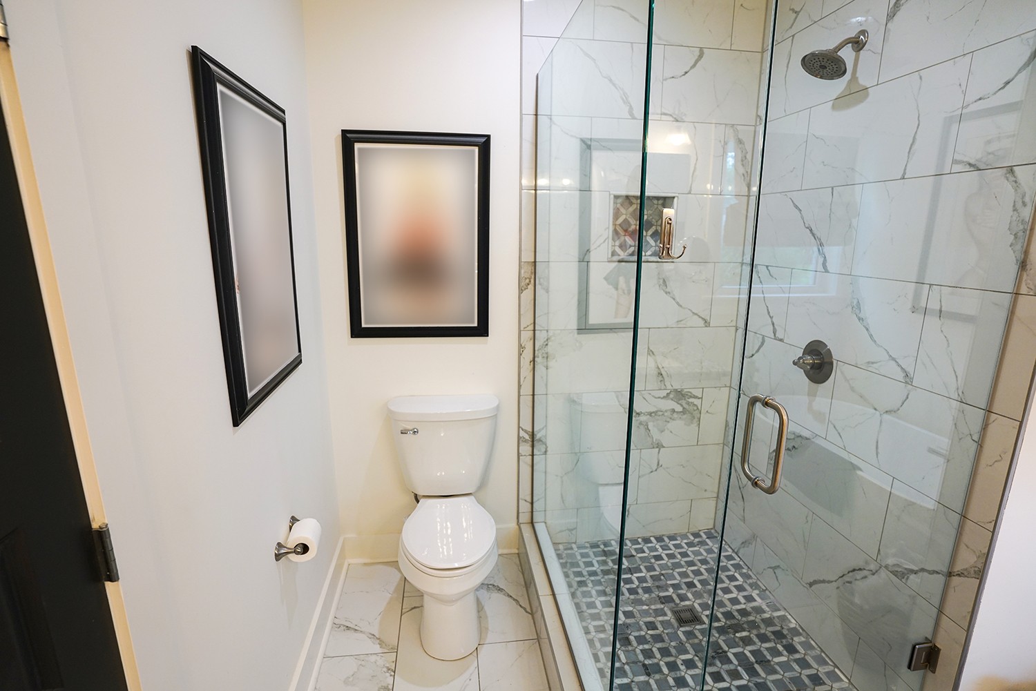 124 Piney Road Dickson, TN 37055 - Photo 29 of 39 a bathroom with a toilet and a shower