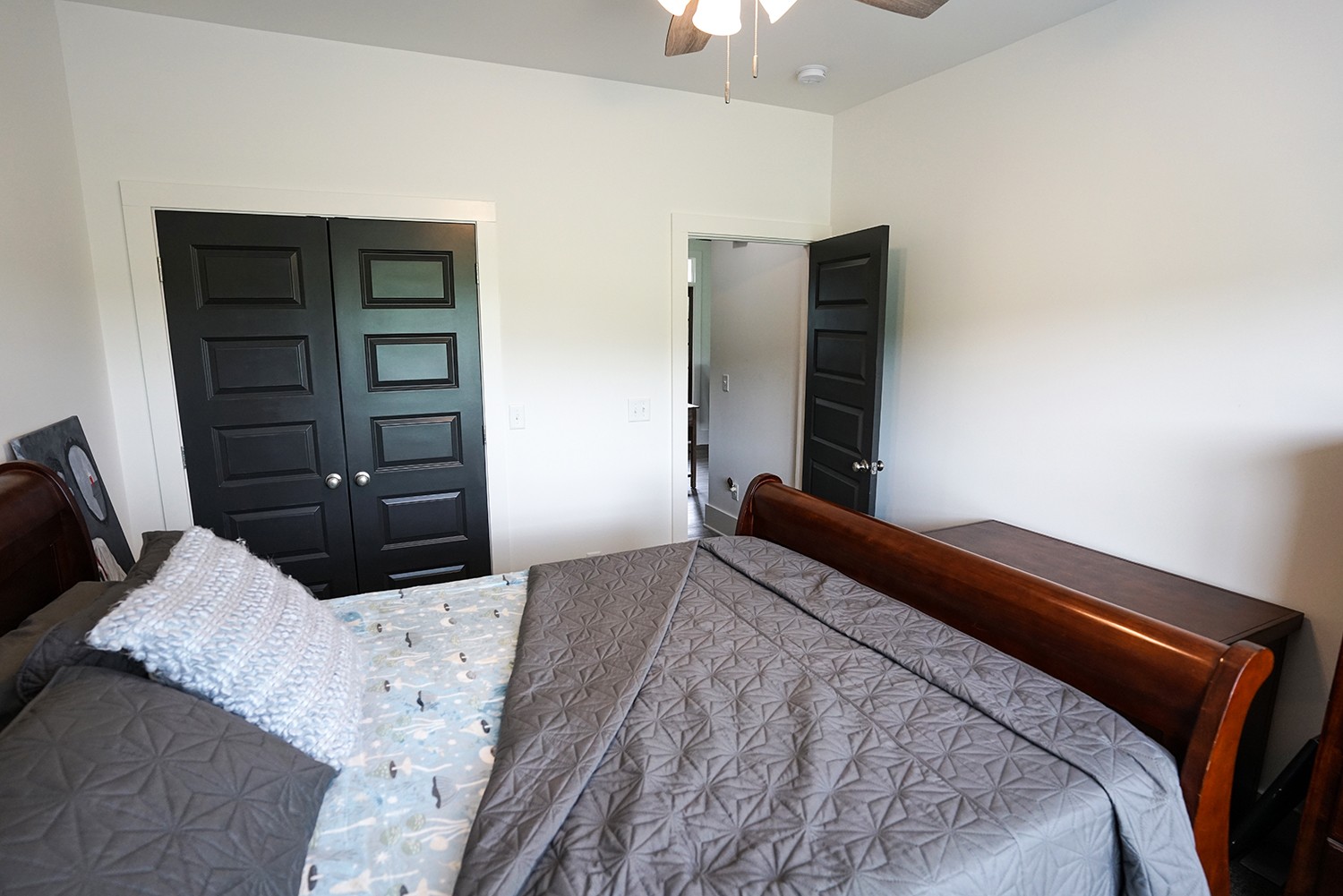 124 Piney Road Dickson, TN 37055 - Photo 35 of 39 a bedroom with a bed and a dresser
