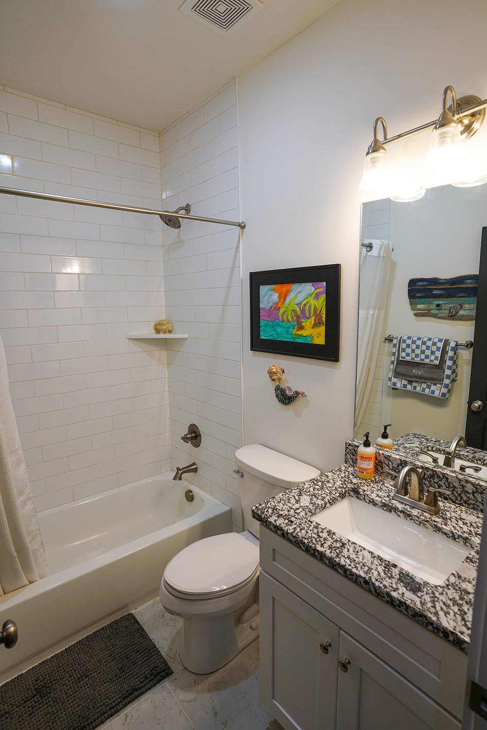 124 Piney Road Dickson, TN 37055 - Photo 36 of 39 a bathroom with a granite countertop sink toilet and shower